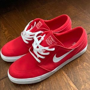Stefan Janoski red and white sneakers